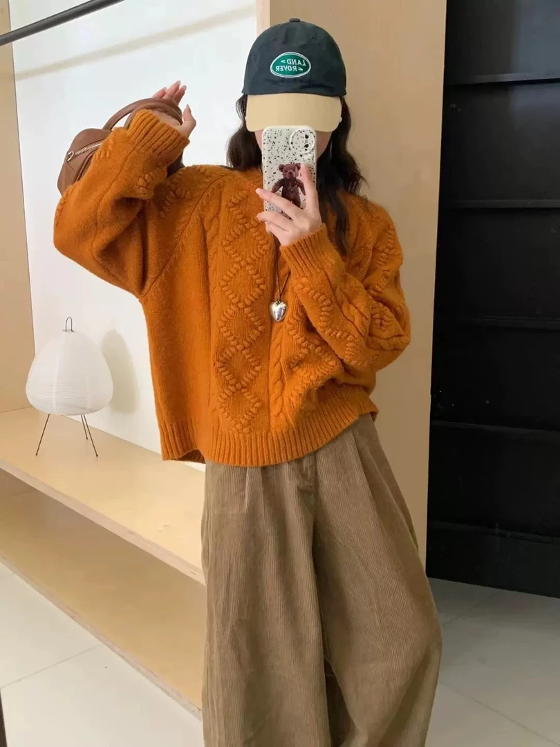 韩系高级感穿搭超好看的粗棒针熟橘色毛衣女秋冬2024新款麻花上衣