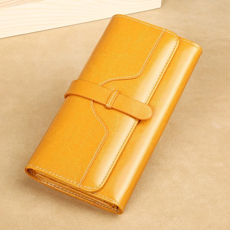 黄色大气女士牛皮长款钱包女款高档多功能三折皮钱夹2025新款复古