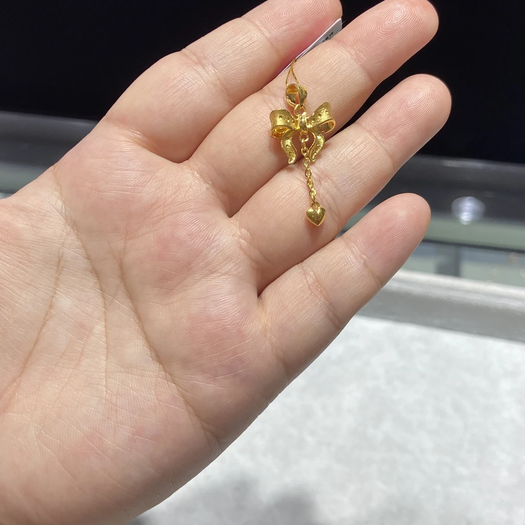 足金999 5G蝴蝶结流苏吊坠 2.670