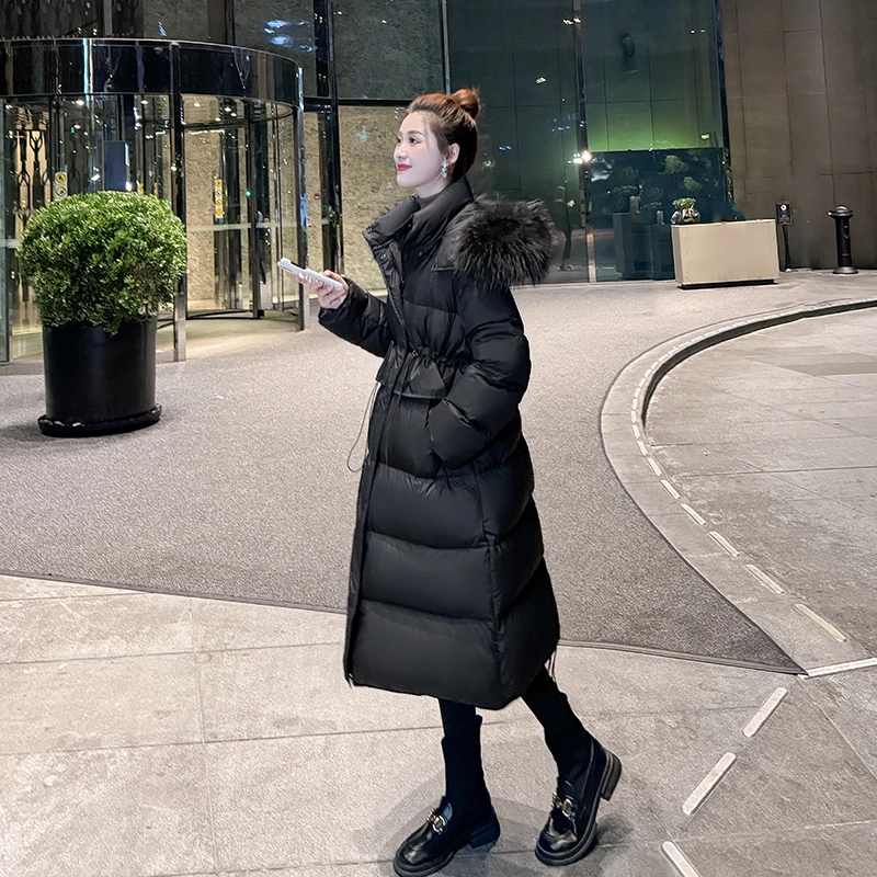 黑色收腰大毛领长款羽绒服女2025新款冬修身加厚90白鸭绒过膝外套