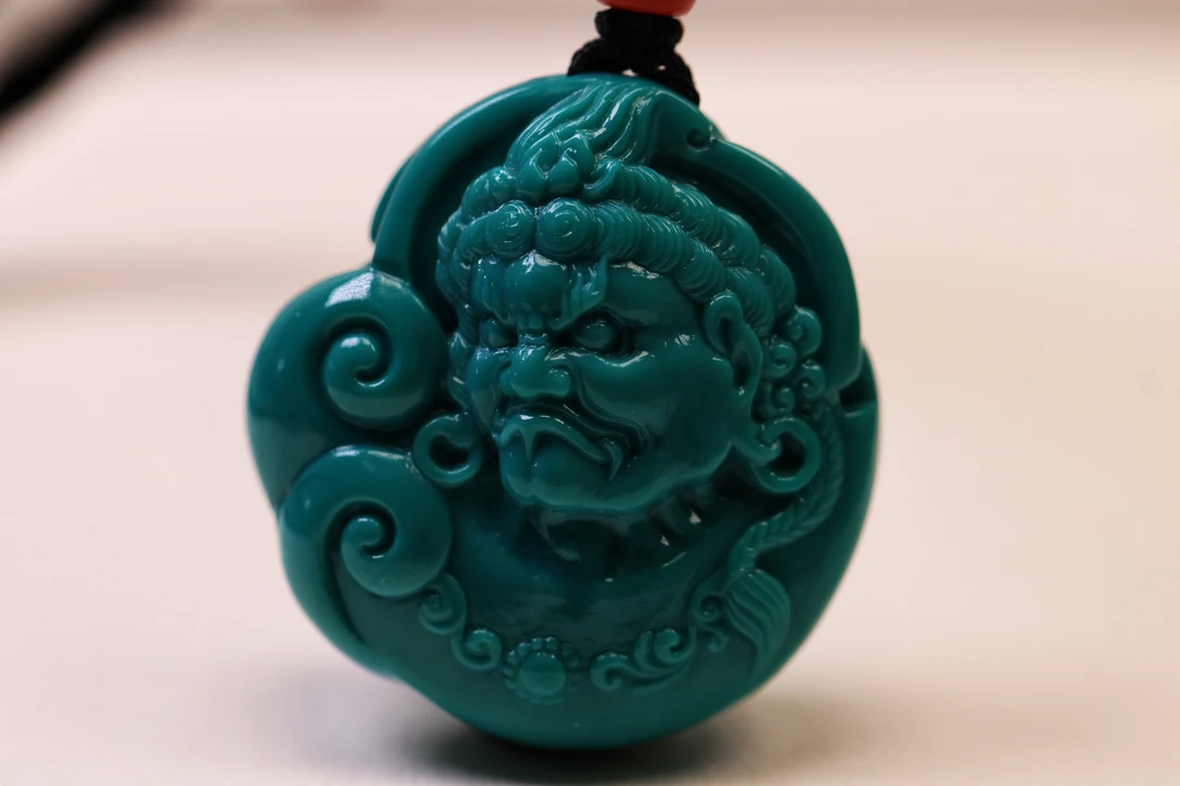 原矿绿松石不动明王尺寸18.2×16.5重量18.1克