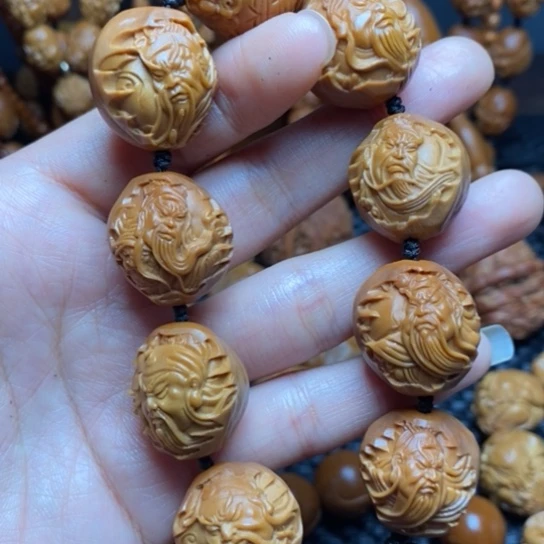 橄榄核吊坠大**叔包衣关公