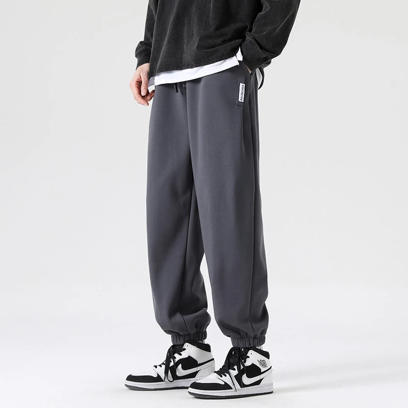 春秋休闲裤男士小脚束脚卫裤百搭情侣运动裤潮大码抽绳阔腿弹力