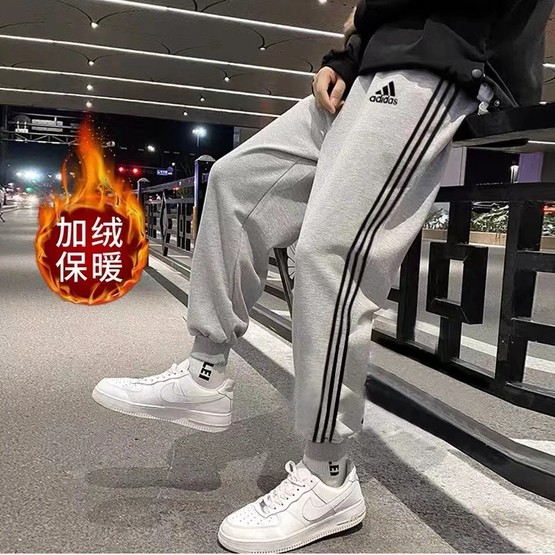 阿迪达斯潮流秋冬季男女款休闲卫裤加厚绒时尚百搭【束脚平口】长裤