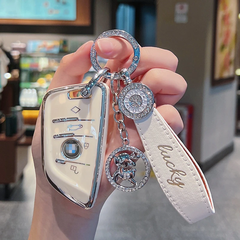 适用宝马钥匙套5系3系1系7系x1x2x3x4x5x6刀锋壳530车男女高档包