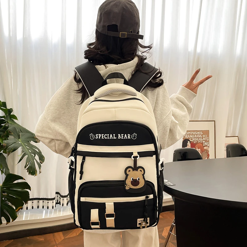 时尚新款初高中学生大容量书包轻便减负背包小学生简约结实双肩包