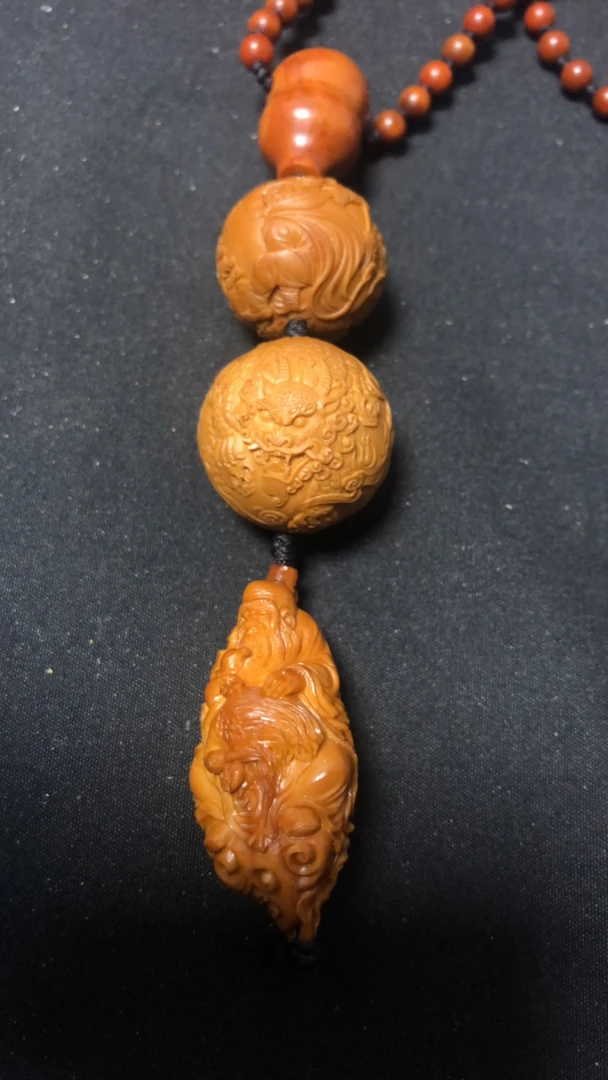 新年专属橄榄核雕老寿星手把件