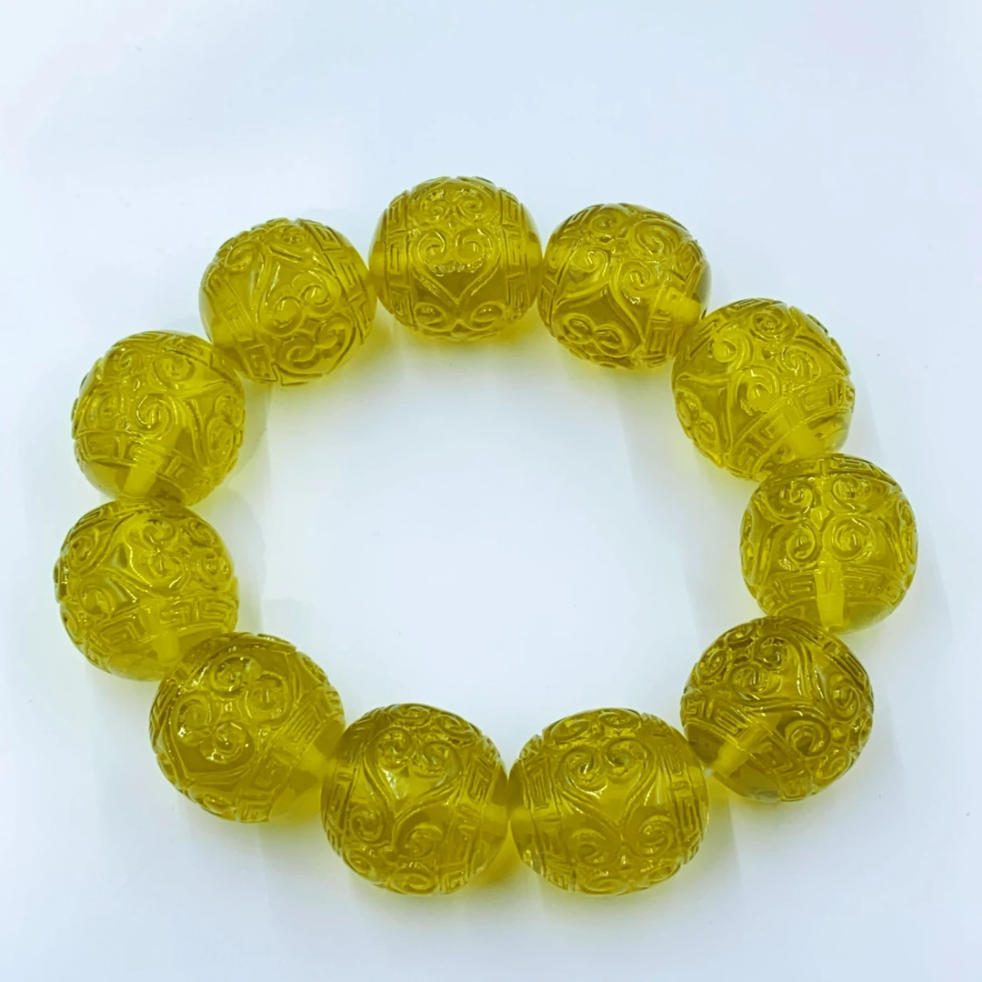 SZ164  精美黄色雕刻玲珑珠珠手串多样性发货