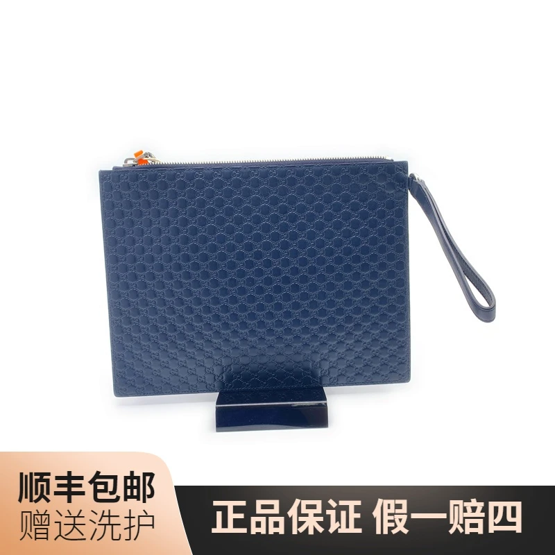 95新 GUCCI/古驰 95新 GUCCI/古驰 藏青色压印手拿包/10004813