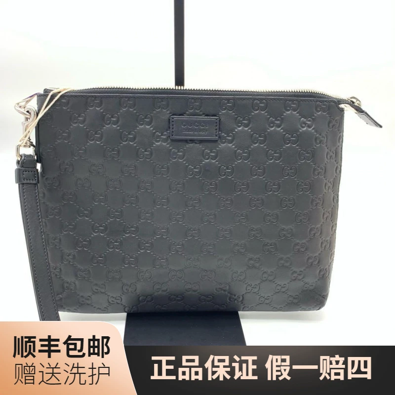 95新 GUCCI/古驰 古驰黑老花压印手拿包/10018540 男士 奢侈 时尚