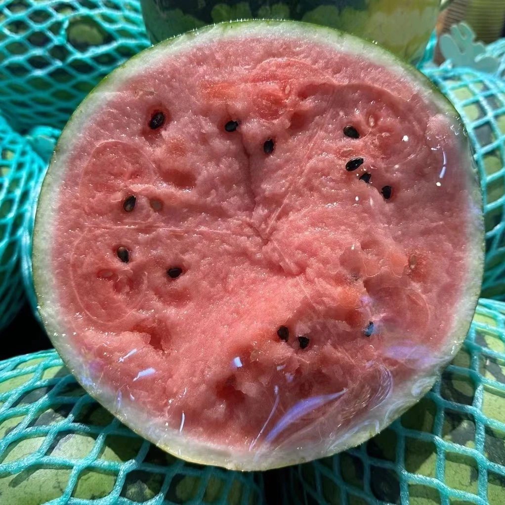 热卖【麒麟西瓜】半个约5.5-6斤左右