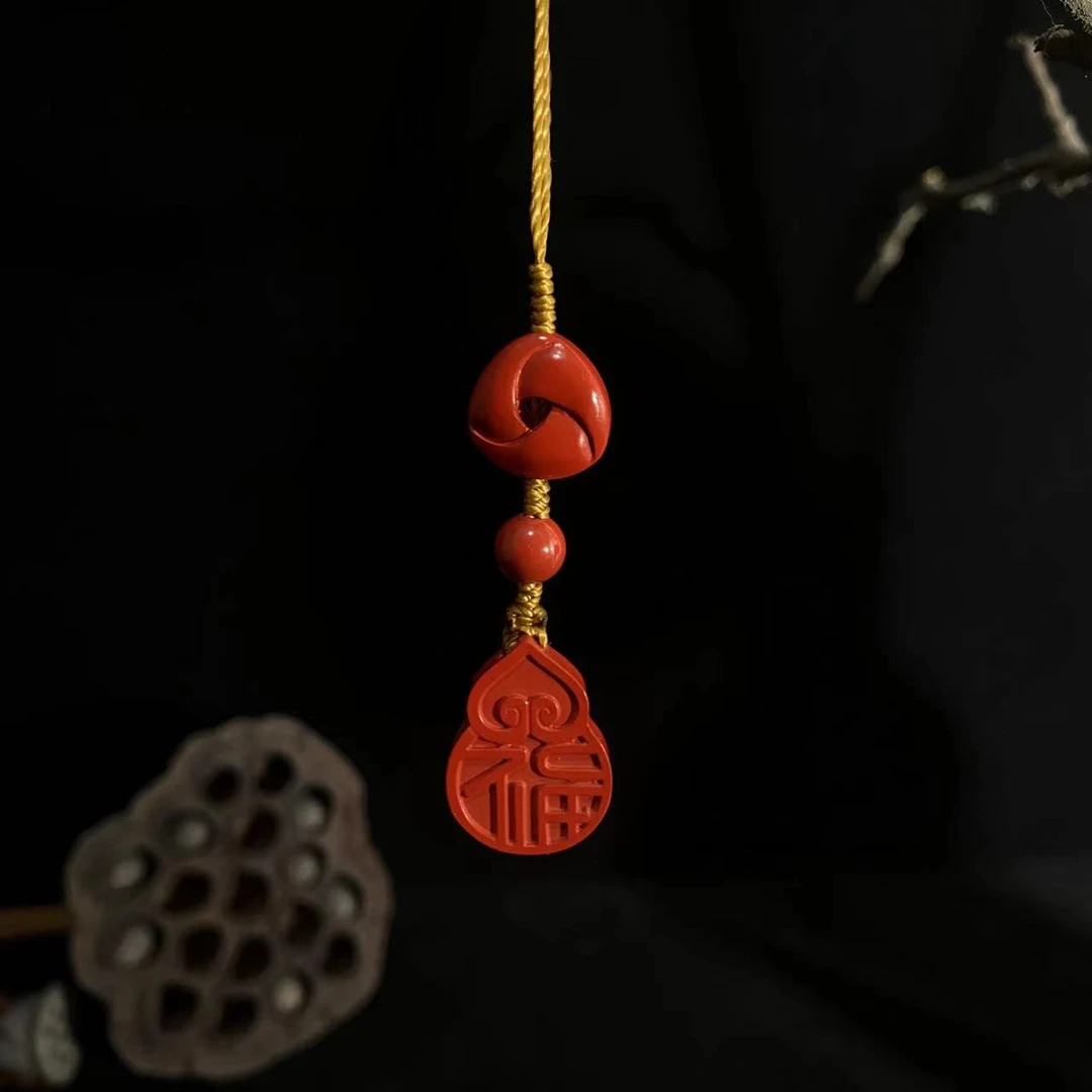 含辰砂工艺品含辰砂工艺品高含量朱砂手机挂包挂情侣款