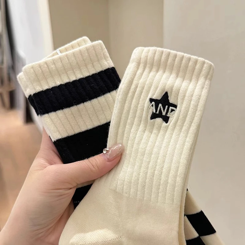 白色袜子女中筒袜春秋新款ins潮网红款个性街头滑板运动长筒袜
