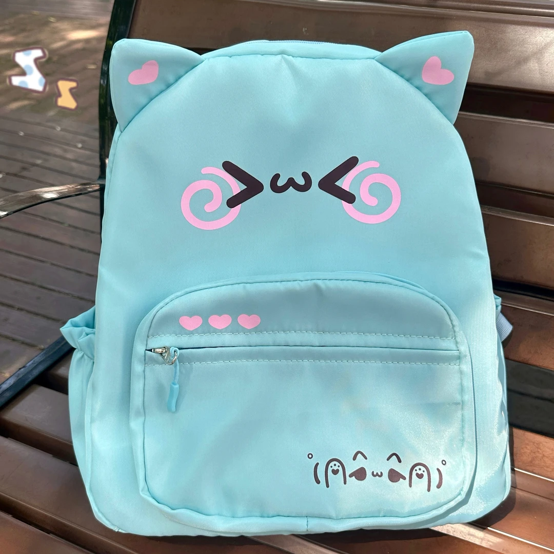 邱邱自制日系可爱帆布颜文字百搭学生软妹双肩包书包