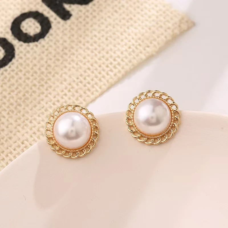 铜合金仿珍珠耳饰 正圆太阳花E594