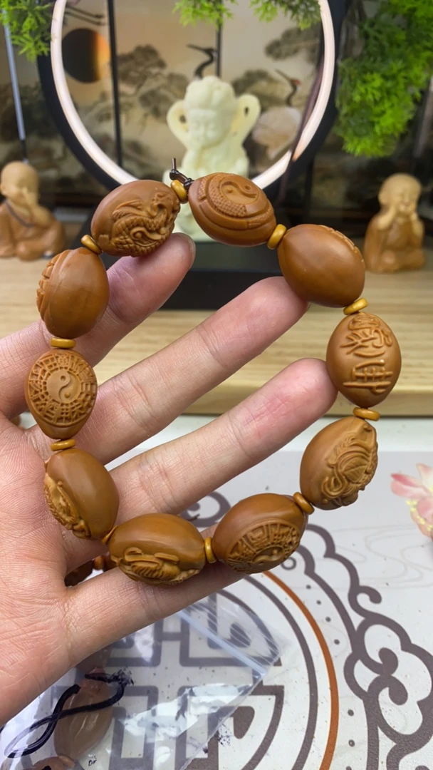 橄榄核雕工艺手串四象八卦强