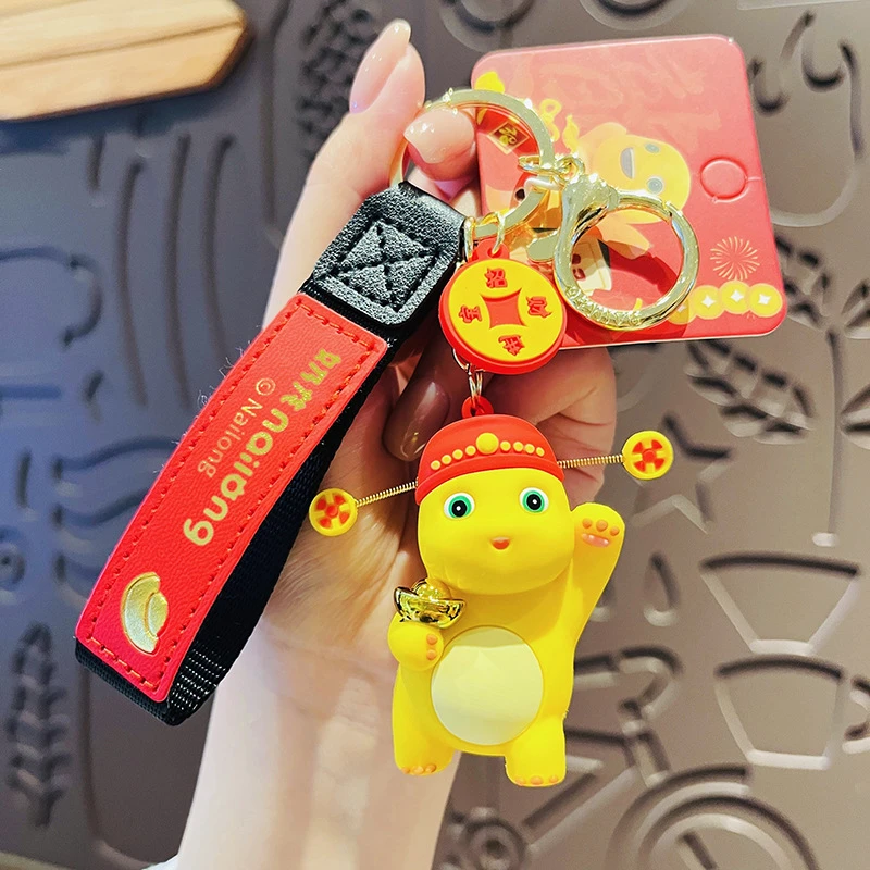 正版醒狮奶龙蛇年钥匙扣女创意财神爷钥匙链书包挂件新年礼品