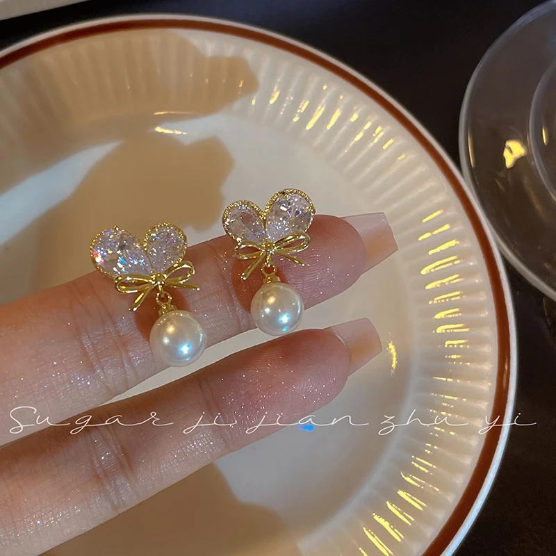 合金仿珍珠耳饰 轻奢高级感爱心蝴蝶结耳钉女设计小众百搭耳环ins