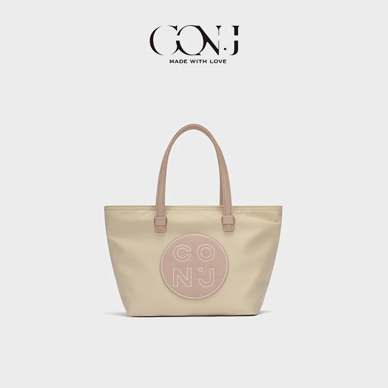 CON.J韩版时尚休闲春夏轻便女士简约通勤便携小众手提单肩包
