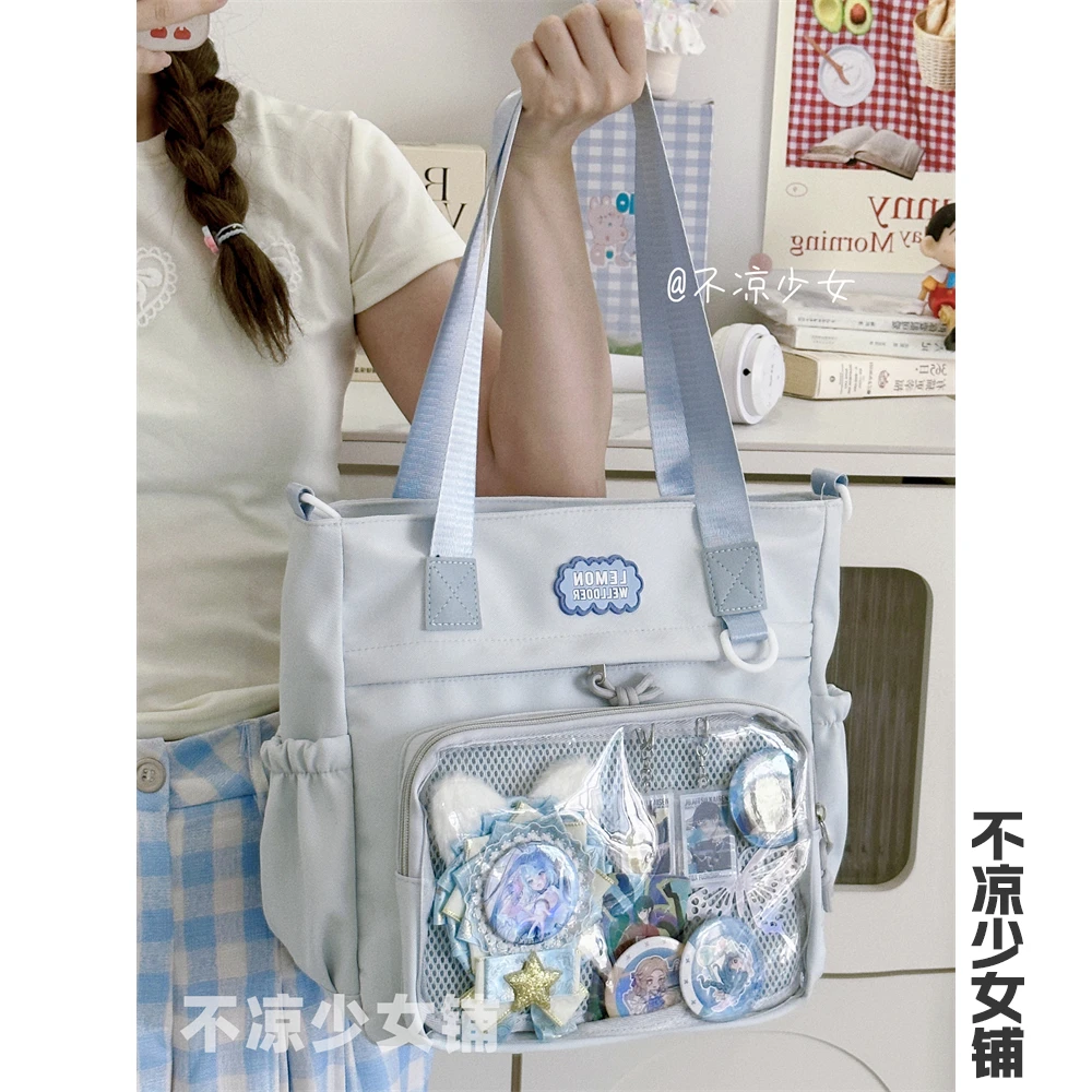 二次元谷子透明斜挎包日系ins学院大容量托特包吧唧扎板痛包娃包