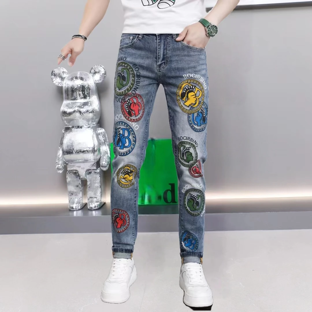 久木欧货秋季薄款牛仔裤男款水印图案中腰百搭时尚小脚青年长裤子