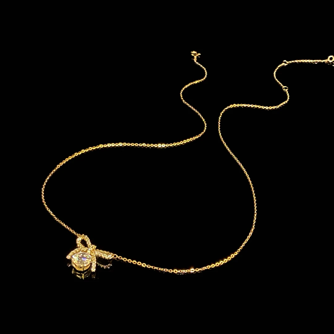 坠链均925银合成锆石 秋冬新款时尚蝴蝶结金色项链X6938