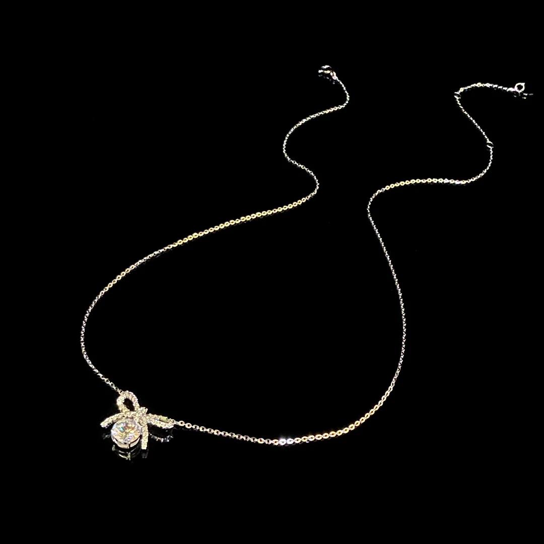 坠链均925银合成锆石 秋冬新款时尚蝴蝶结银色项链X6939
