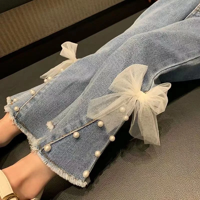 女童牛仔裤2023秋装新款儿童洋气珍珠蝴蝶结喇叭裤女宝宝外穿时尚