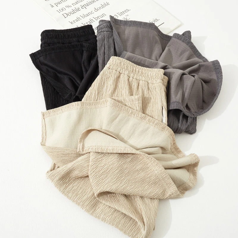 后面开叉休闲居家显瘦百搭宽松紧高腰夏季薄款中长款半身裙女邹邹