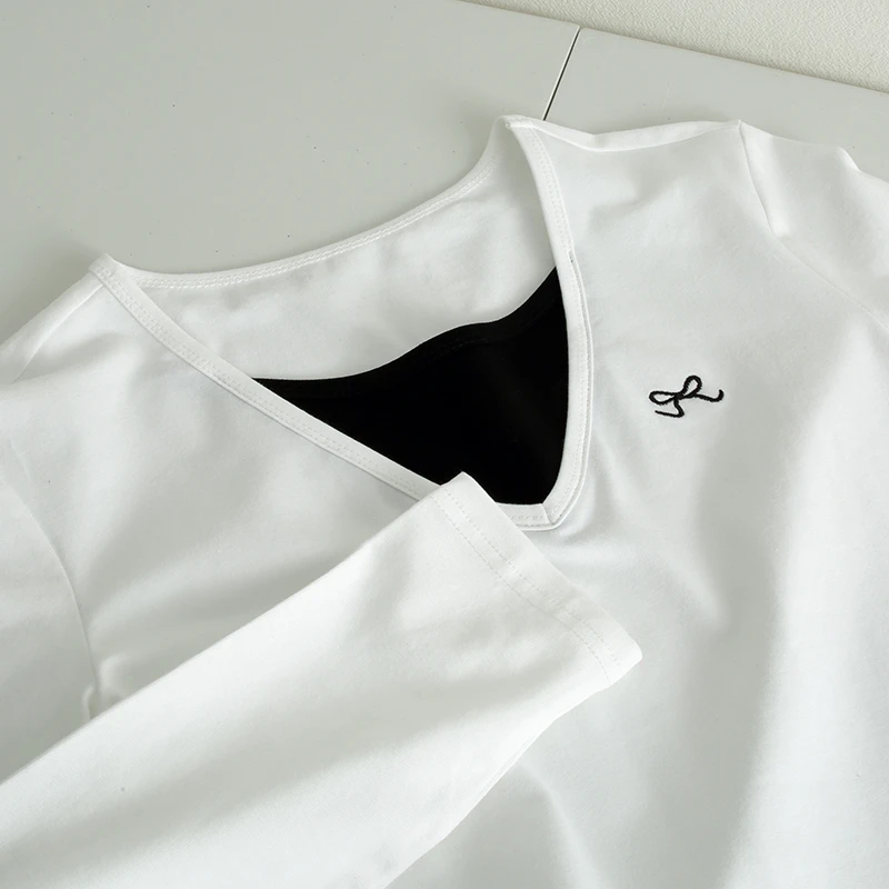 实用假两件拼色蝴蝶结长袖t恤女2024秋季新款修身显瘦打底衫上衣