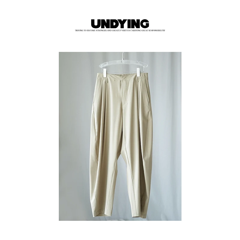 UNDYING 绿卡其弧形长裤男女同款休闲裤春夏季设计感简约时尚裤子