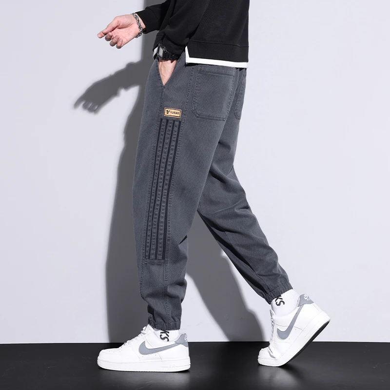 秋冬男士休闲裤宽松大码哈伦条纹裤子男韩版潮流束脚爆款工装裤男