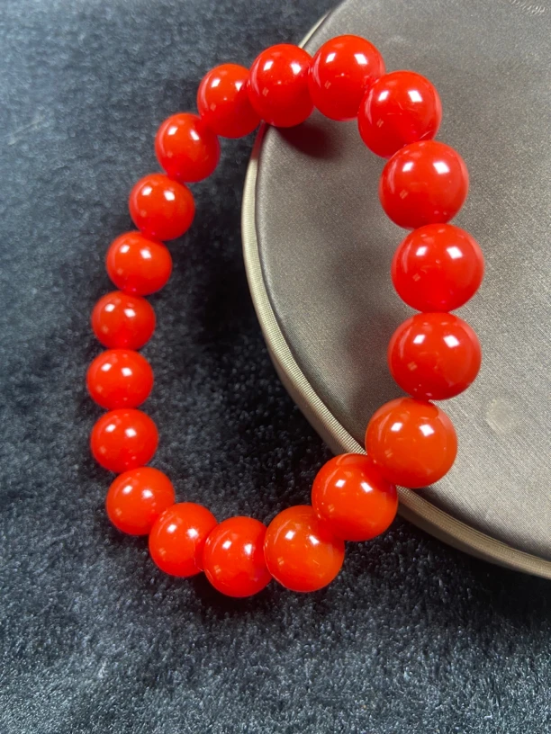 珠宝玉石-天然滴水洞亮光卡10mm单圈手串