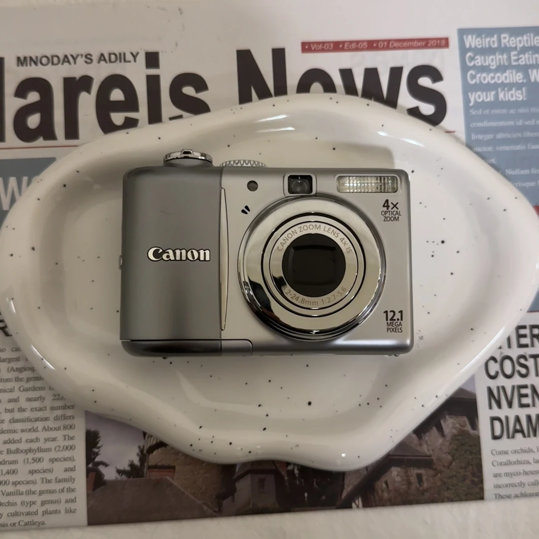 95新  Canon/佳能 a1100 银灰色 1200完像素 ccd