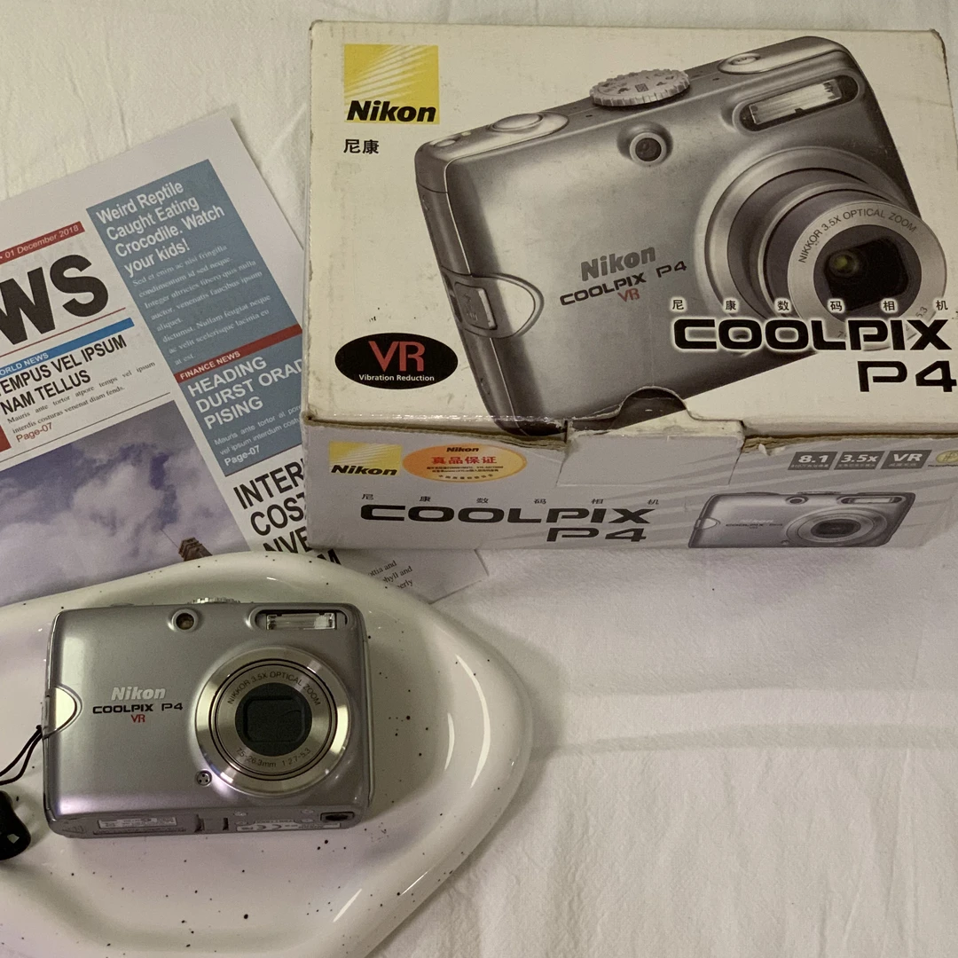 95新  Nikon/尼康 p4 银灰色 810万像素4倍变焦ccd数码相机