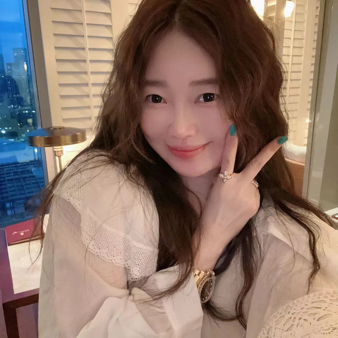 【BORAKOO】白色苎麻荷叶翻领韩版娃娃衫