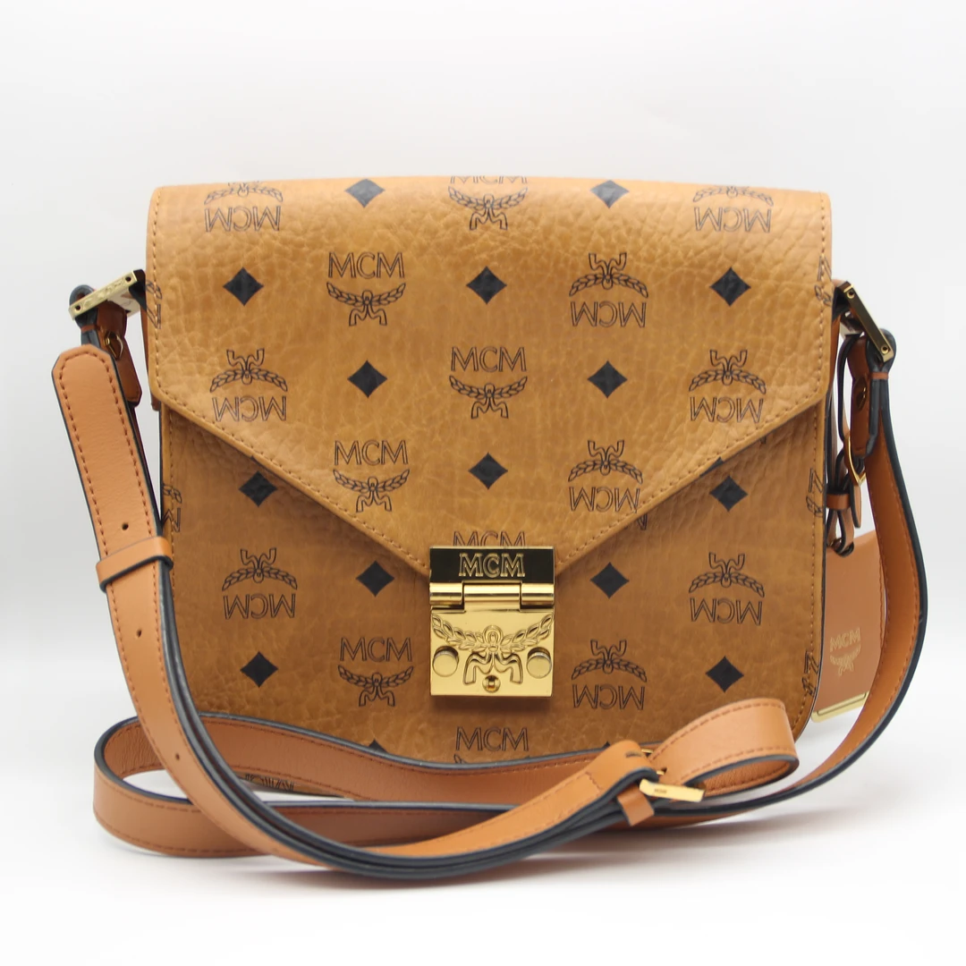 95新 MCM 马鞍/单肩包MWS8APA03CO001