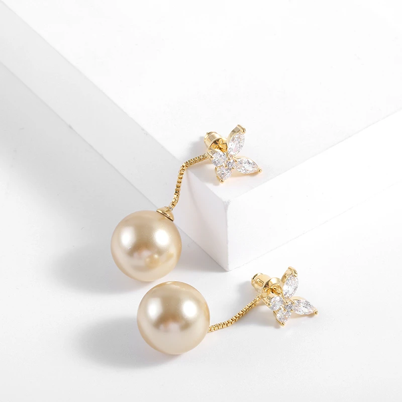 铜合金仿珍珠耳饰 美拉德蝴蝶风在吹灵动设计款耳环