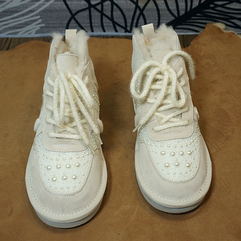 冬季新款真皮牛皮女士雪地靴 平跟保暖女靴6-20