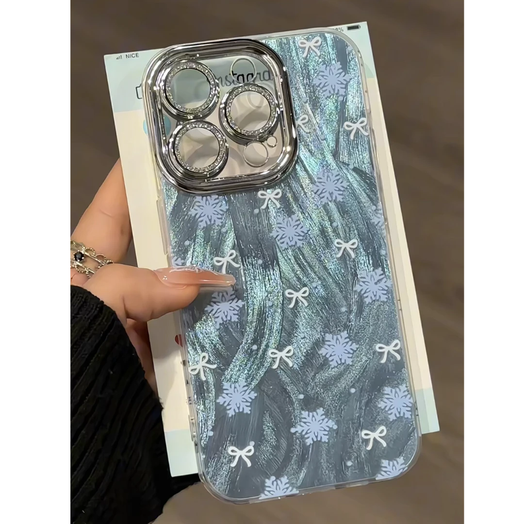 适用苹果15银色精孔羽纱iPhone16手机壳满屏蝴蝶结雪花华为mate60