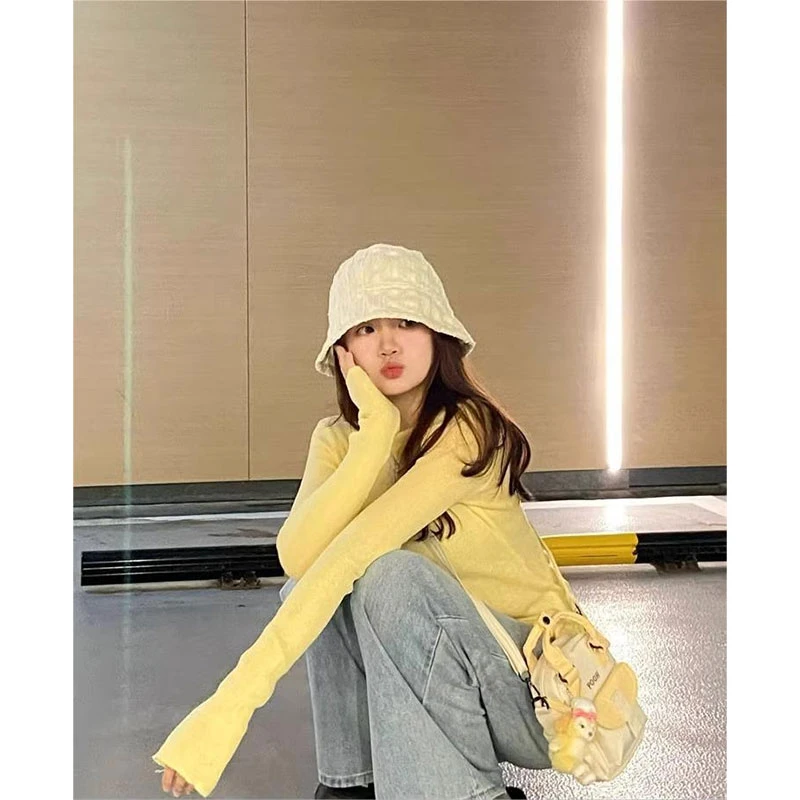 多巴胺穿搭奶黄色长袖T恤女春秋2024内搭针织打底衫修身甜辣上衣