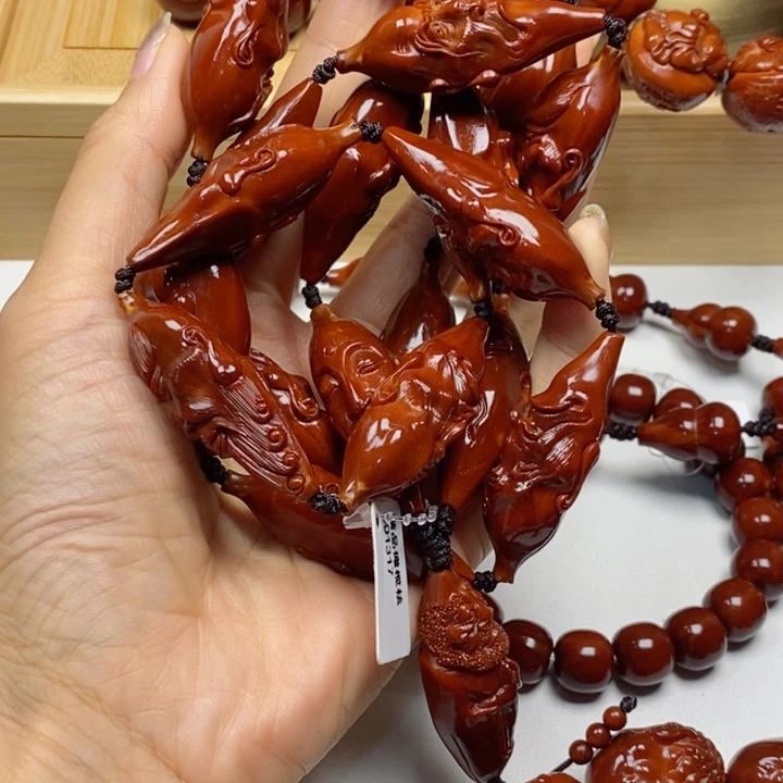 橄榄核吊坠做****己橄榄核手串
