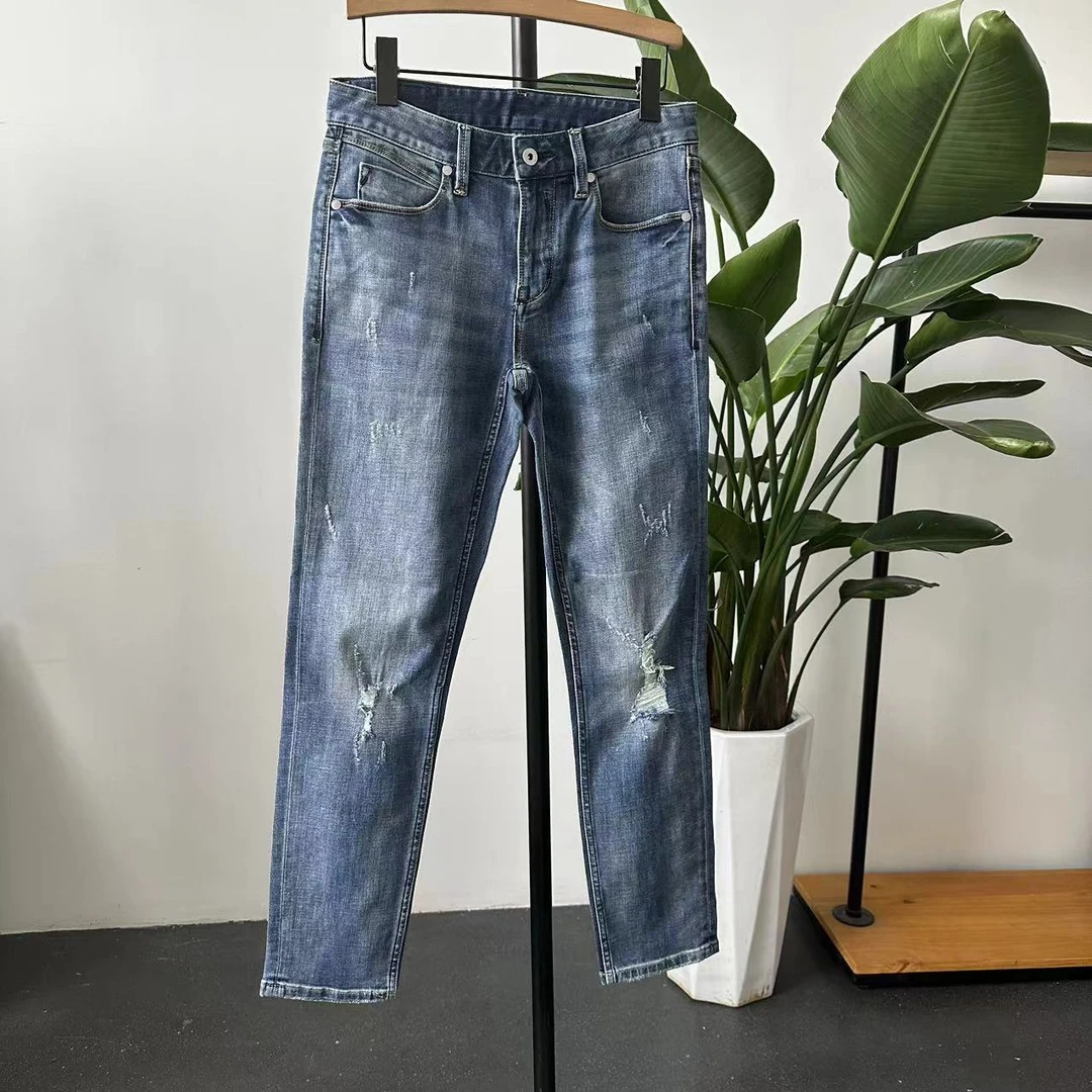P-40  潮牌情侣款破洞水洗休闲牛仔裤 03102