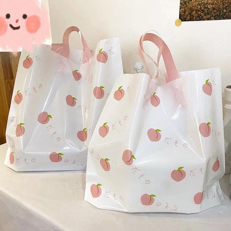 服装店袋子手提塑料袋夏日水蜜桃清新诱惑塑料袋化妆品袋包装袋