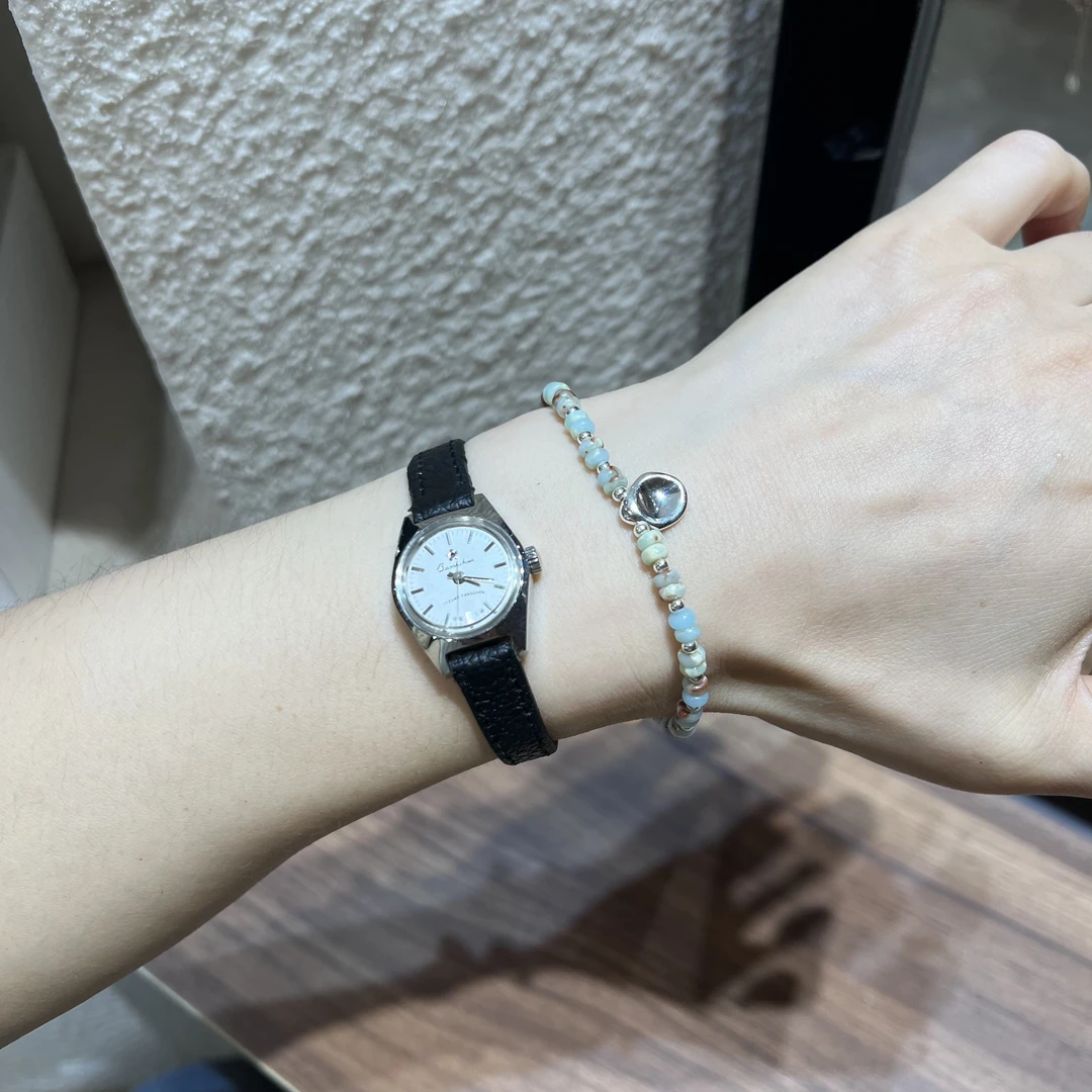 925银手链 阿腾莎银饰 扁扁钱袋手链 它是钱袋吗？颜色挺好看