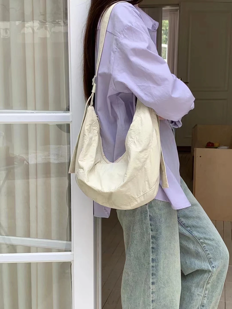 七七 韩版ins简约尼龙斜挎布包女2024新款学生大容量单肩包帆布包