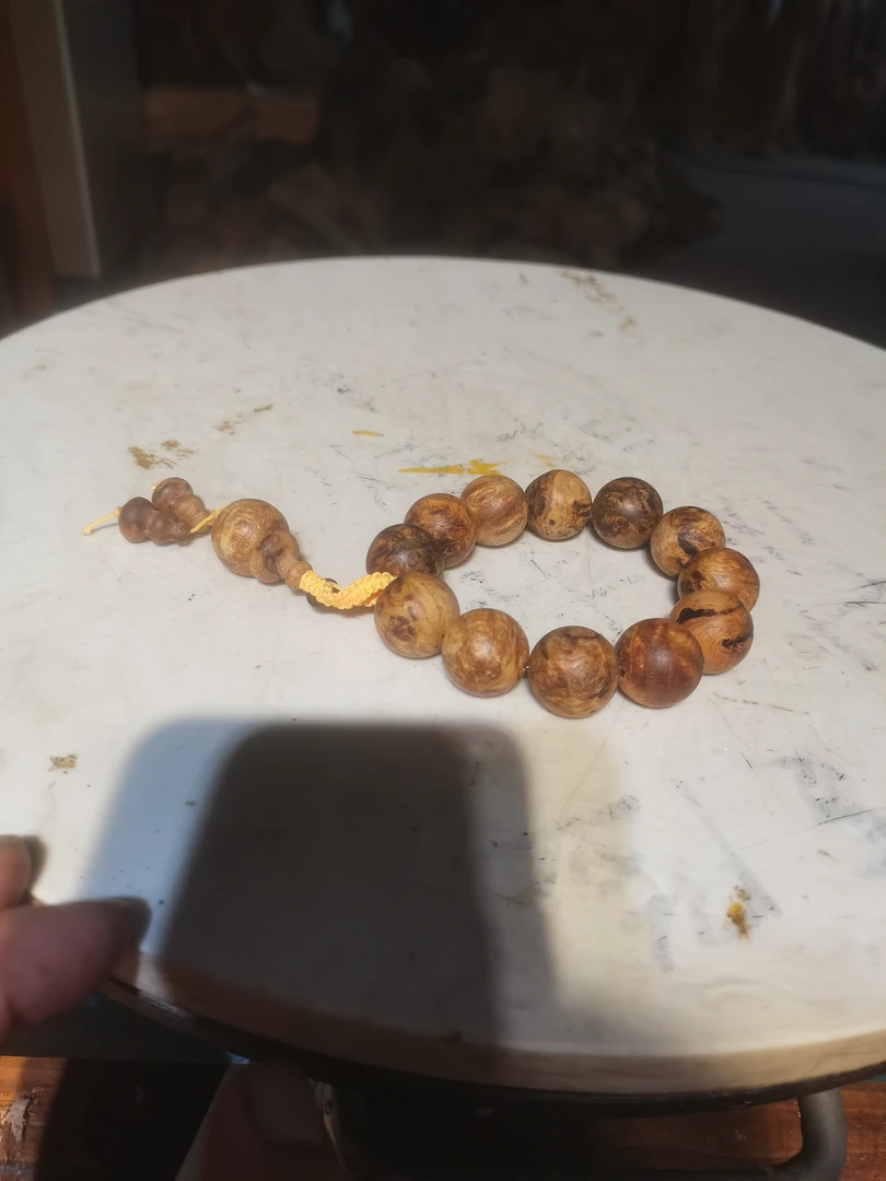 【一】北沉香香琥珀木手把件