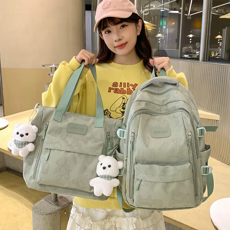减负护脊高中生书包女初中生大容量双肩包大学生旅行秋冬新款背包