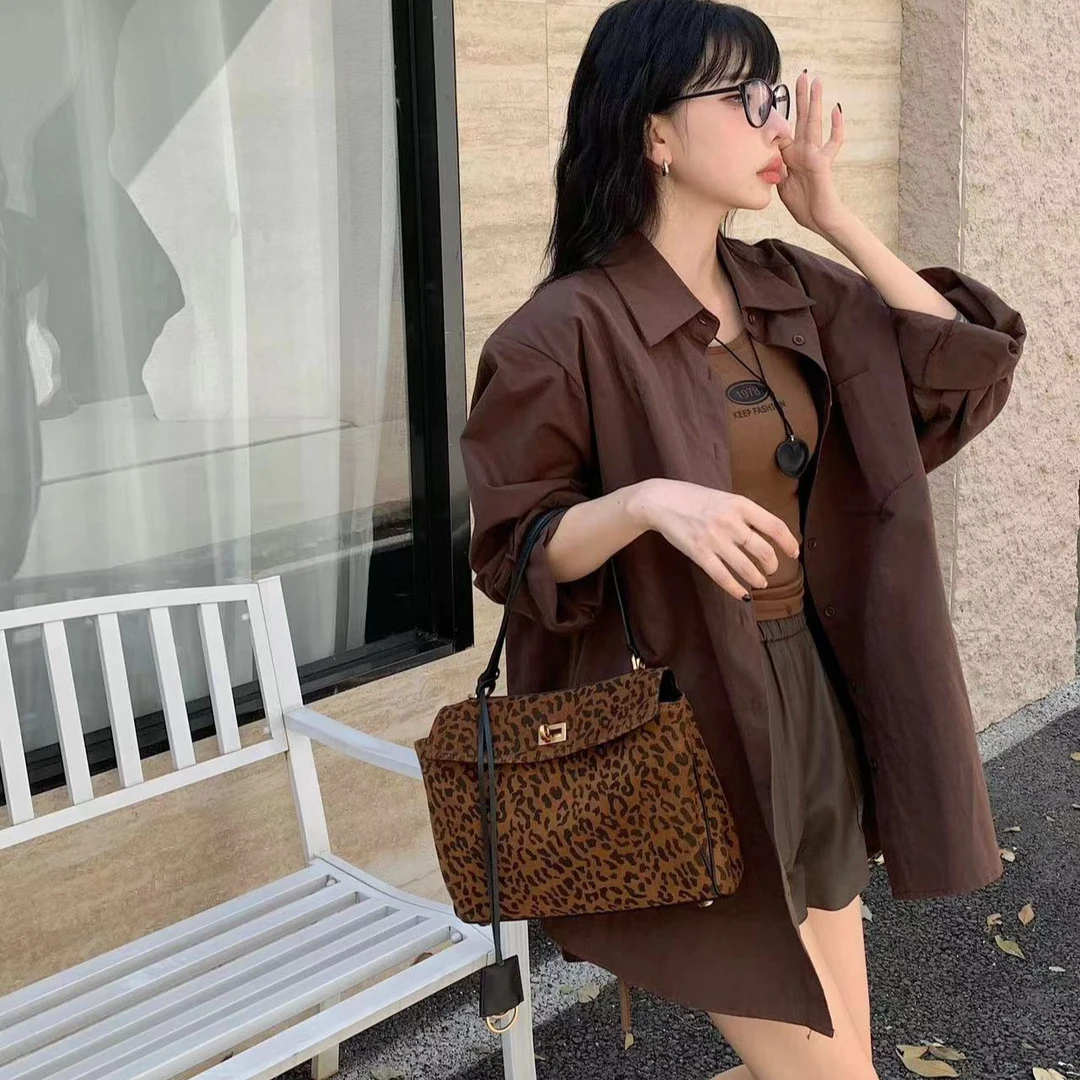 小众高级牛皮豹纹公文包秋冬新款大容量慵懒风腋下包手提斜挎包