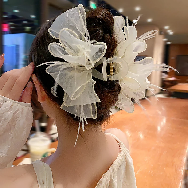 思朵时尚气质多层绢纱蝴蝶结抓夹女高级后脑勺盘发夹超仙羽毛发饰